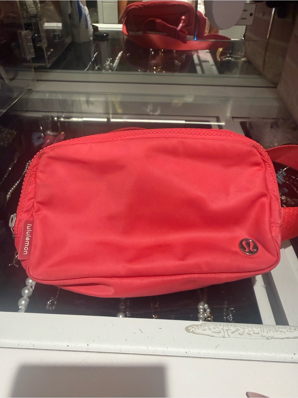 Subcategory selection for red Lululemon pouch